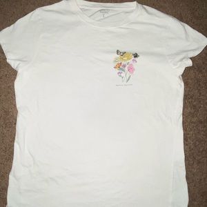 white tee with flower design